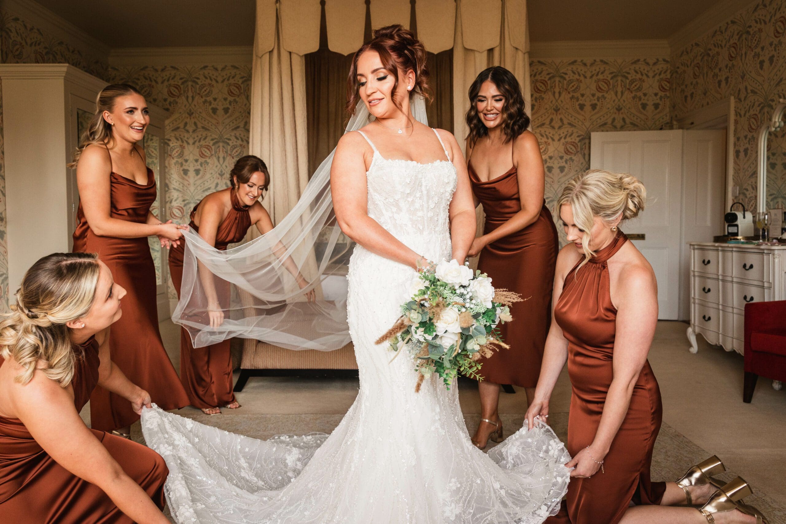 Bride getting ready with her bridesmaids at hodstock priory | Yorkshire Wedding Photographer